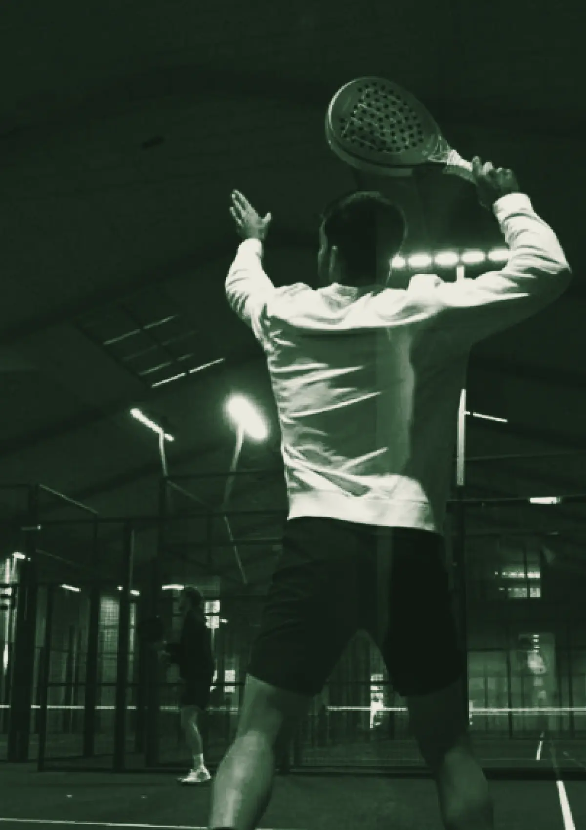 A player seen from behind preparing a smash