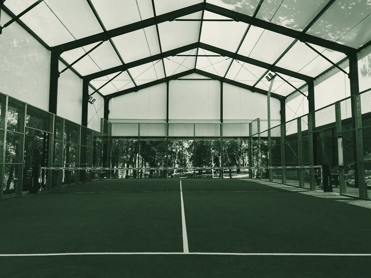 Padel courts under a club roof